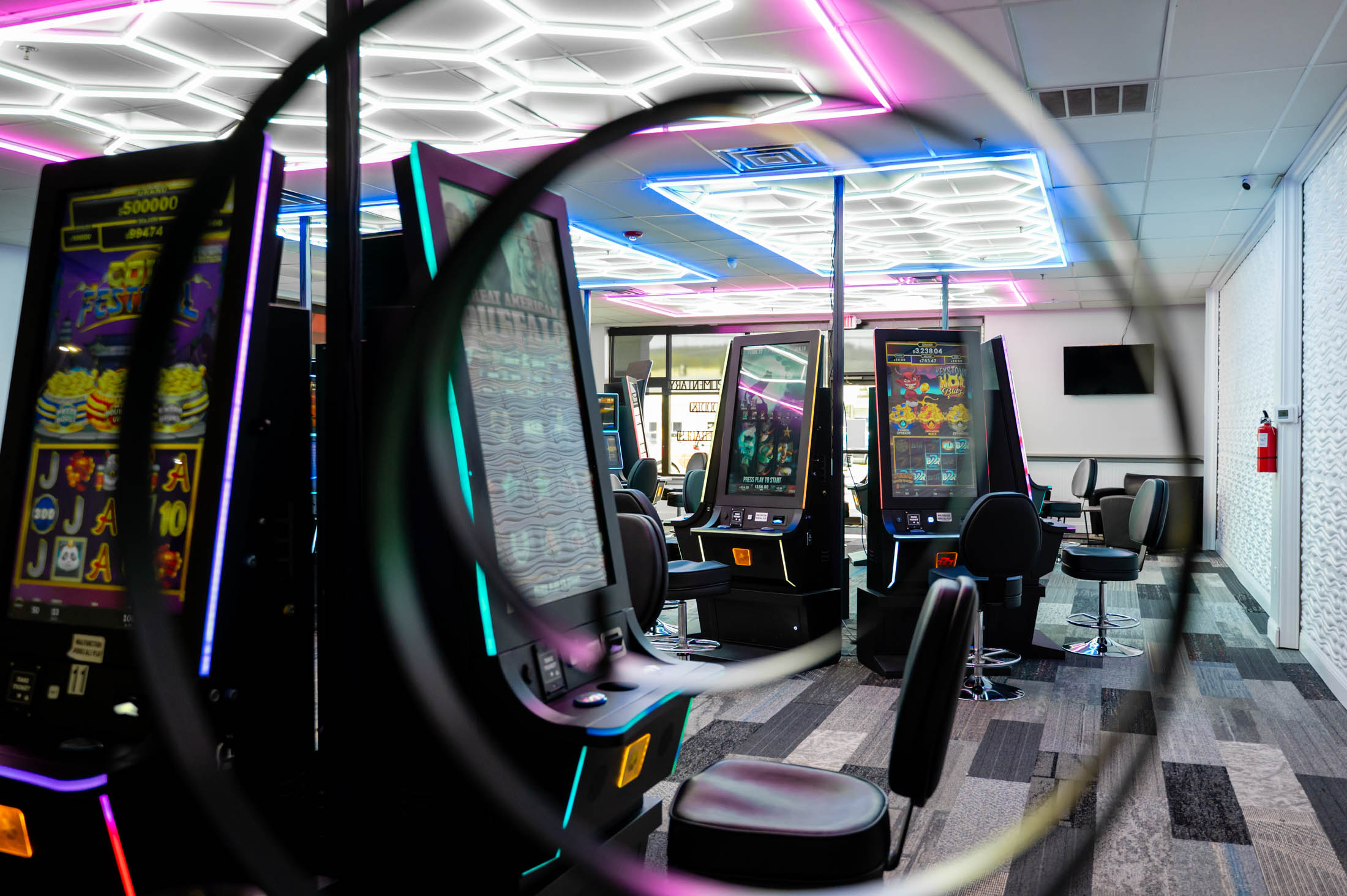GoDaddy_-3735 A room with several different types of gaming machines.